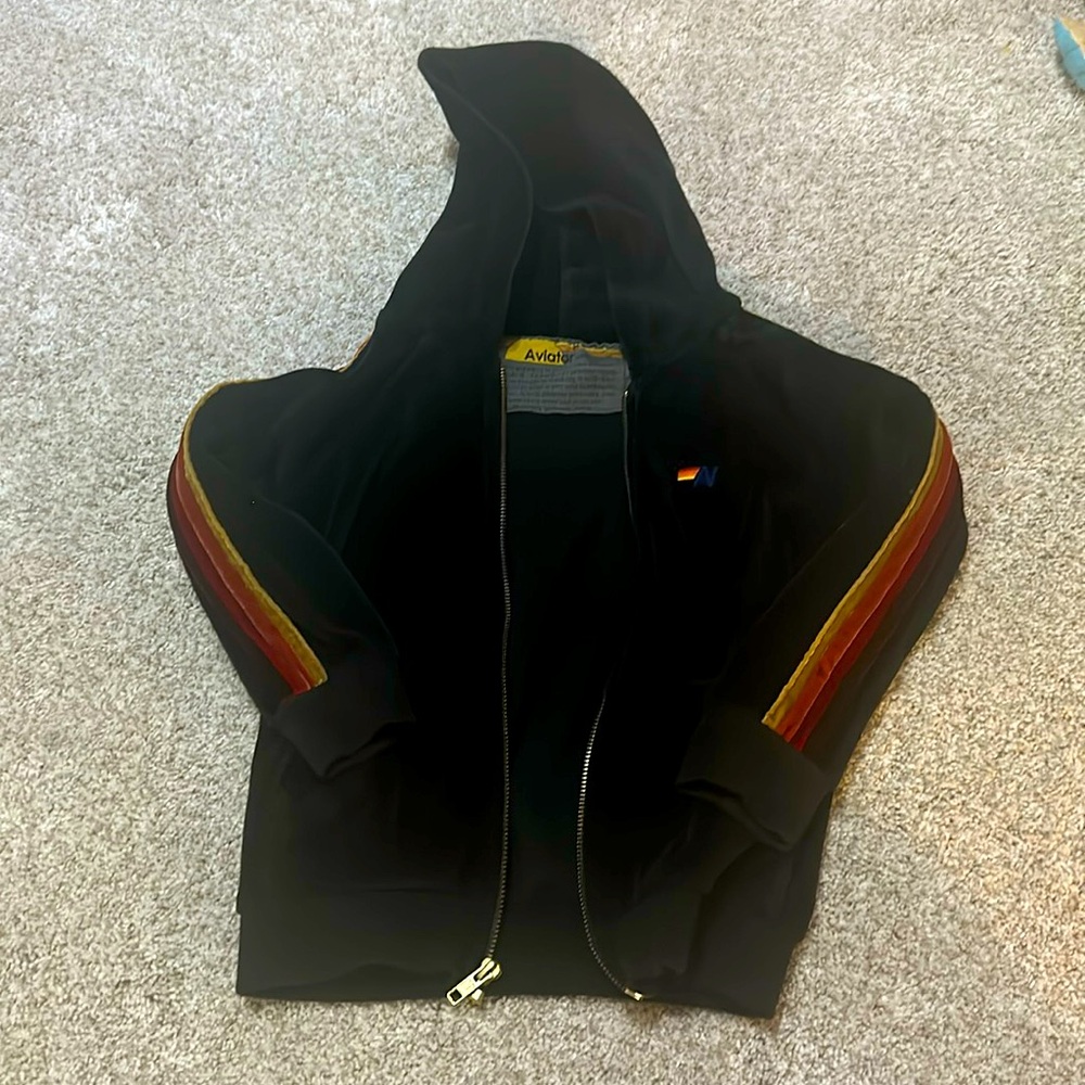 Aviator Nation Black Hoodie with Retro Red-Orange-Yellow Stripes